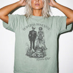 Hopeless Romantic Readers Club Tee in Bay – vintage-style Comfort Colors graphic tee for dark romance readers. Graphic features a skeleton couple on their wedding day.