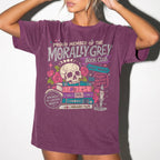 Morally Grey Book Club dark romance bookish tee in Berry color by Comfort Colors, featuring skull, roses, and stacked books graphic with enemies to lovers and trigger warnings text.