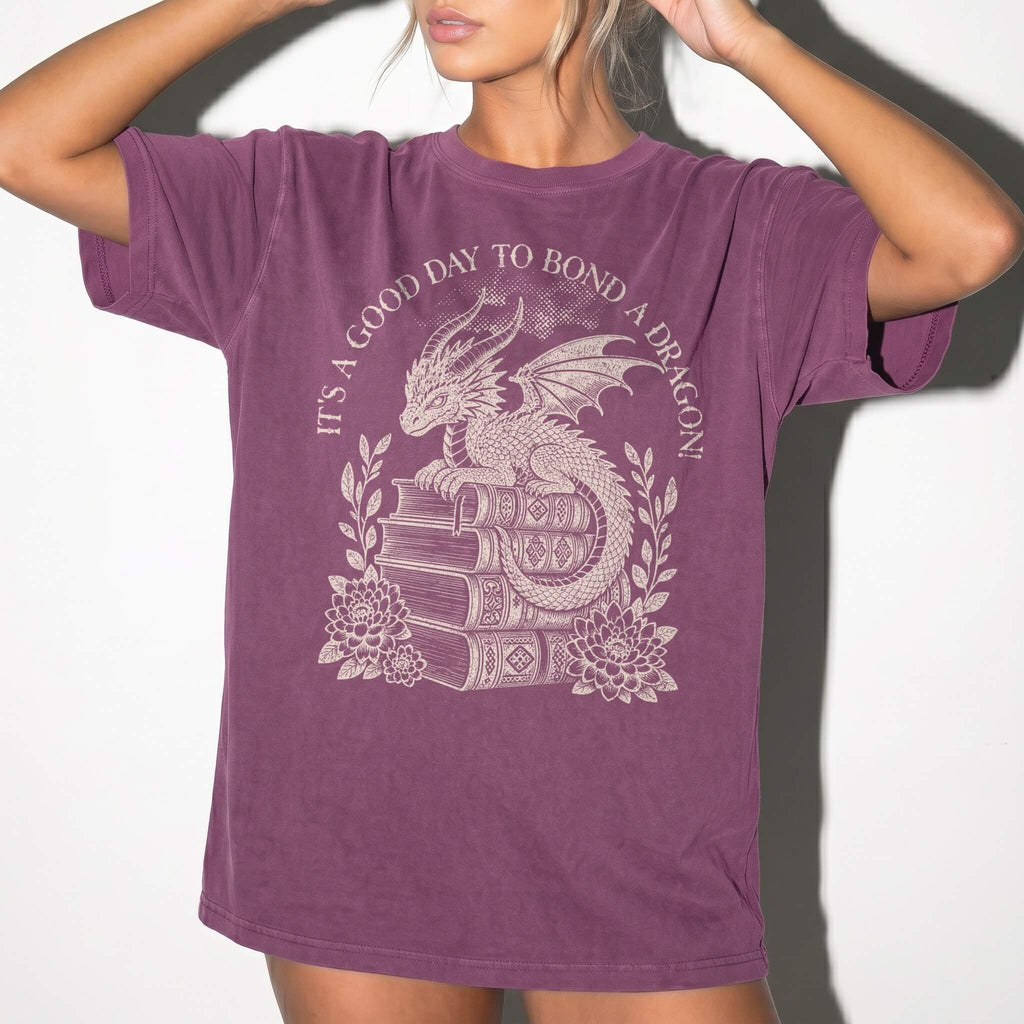 It's a Good Day to Bond a Dragon Tee in Berry – vintage-style Comfort Colors graphic tee for fantasy and romantasy readers