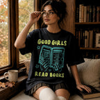 Black color Comfort Colors 1717 relaxed fit t-shirt with Y2K retro doodle graphic — hands holding an open book titled "A Court of Knives, Red Flags, and Emotional Damage" with the text "Good Girls Read Books" above and below