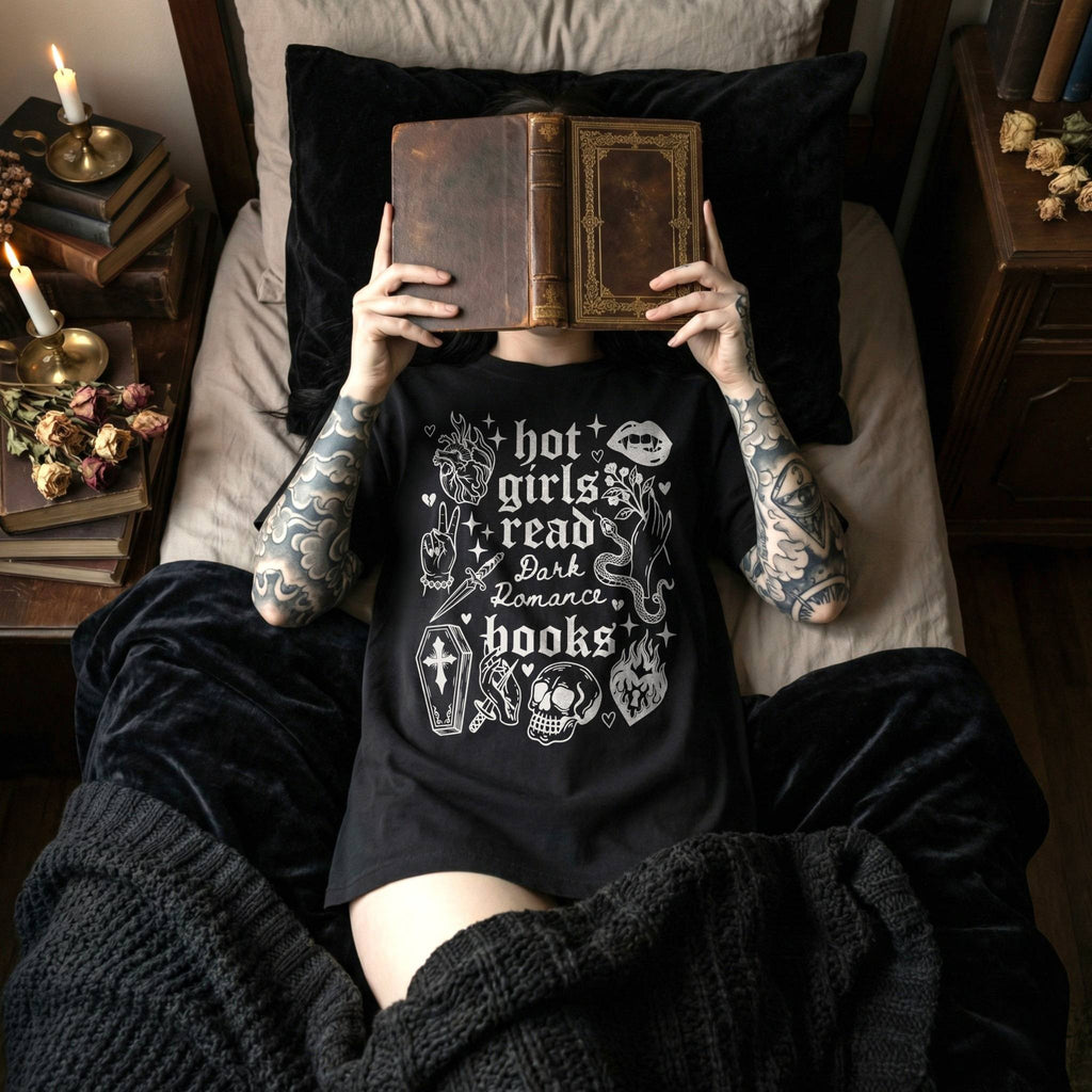 Hot Girls Read Dark Romance Books relaxed fit graphic tee in Black with gothic tattoo-style skull, snake, lips, and dagger print - Novelspun Apparel