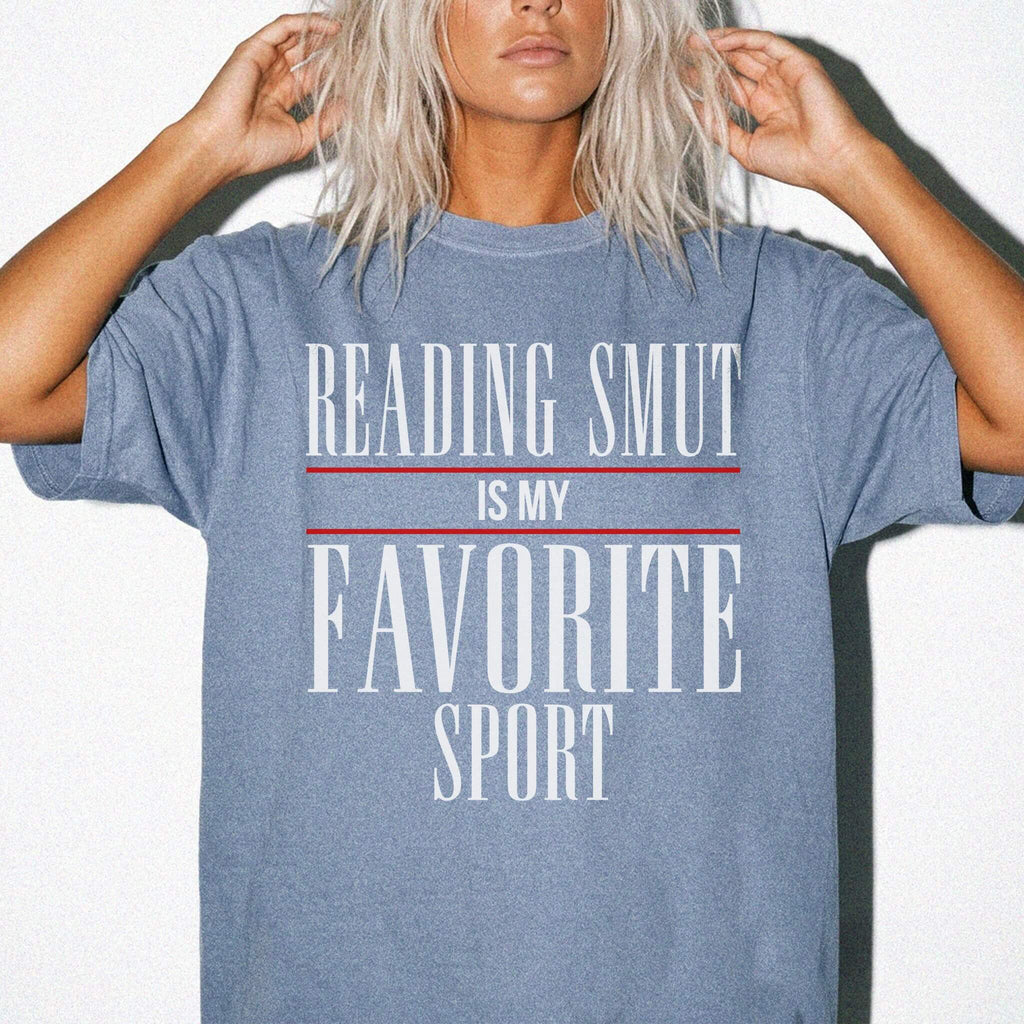 Reading Smut Is My Favorite Sport Tee in Blue Jean – vintage-style Comfort Colors graphic tee for dark romance and romantasy readers