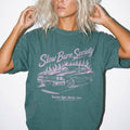 Blue Spruce Comfort Colors 1717 relaxed fit tee with Slow Burn Society retro car flames dark romance graphic — front