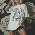 Morally Grey Is My Favorite Color dark academia design on an ivory color tee from Comfort Colors with vintage stacked books and quill graphic.