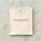 Ivory Comfort Colors tee folded flat reading "Read dark romance they said. It'll be fun they said." in a minimal typewriter font.