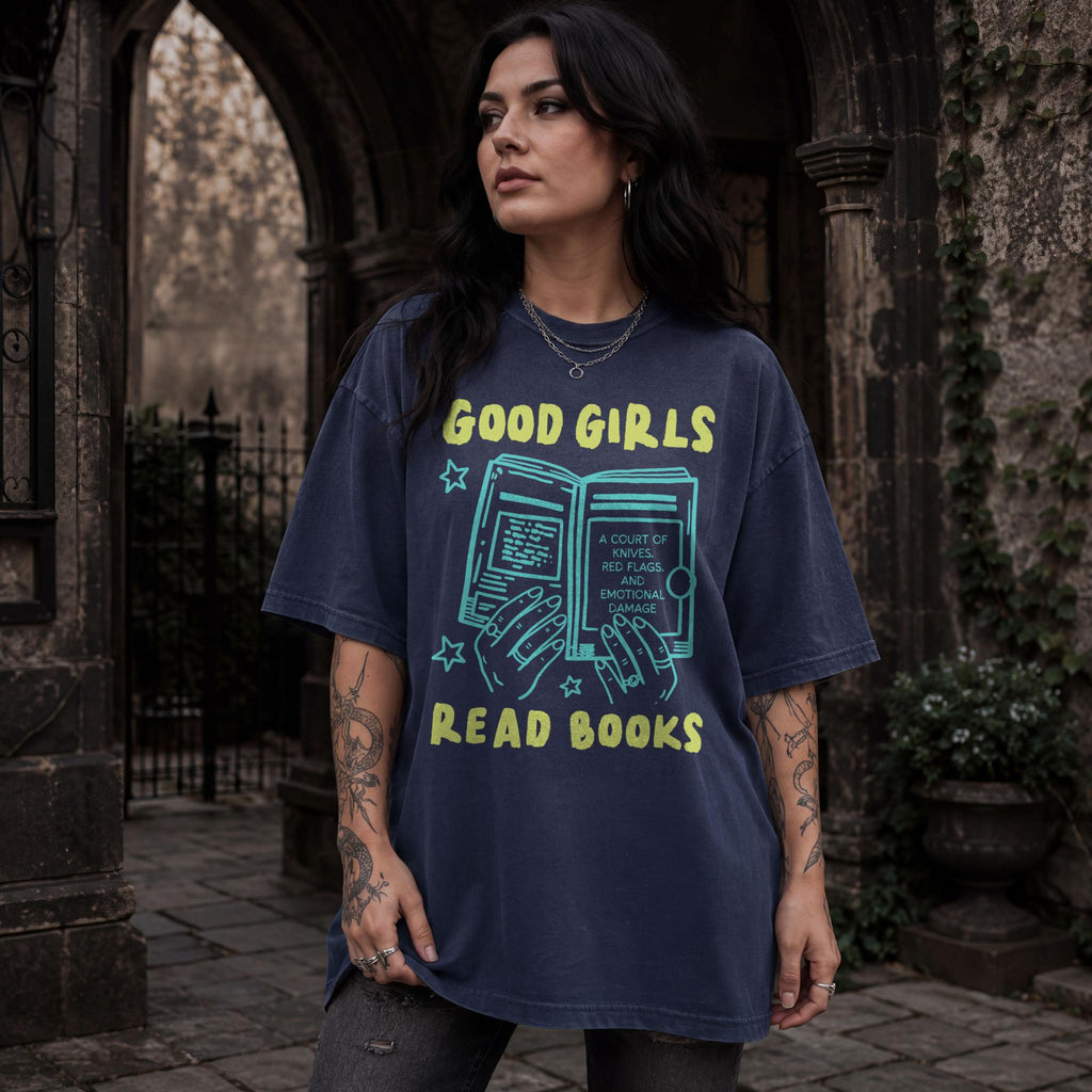 Navy color Comfort Colors 1717 relaxed fit t-shirt with Y2K retro doodle graphic — hands holding an open book titled "A Court of Knives, Red Flags, and Emotional Damage" with the text "Good Girls Read Books" above and below