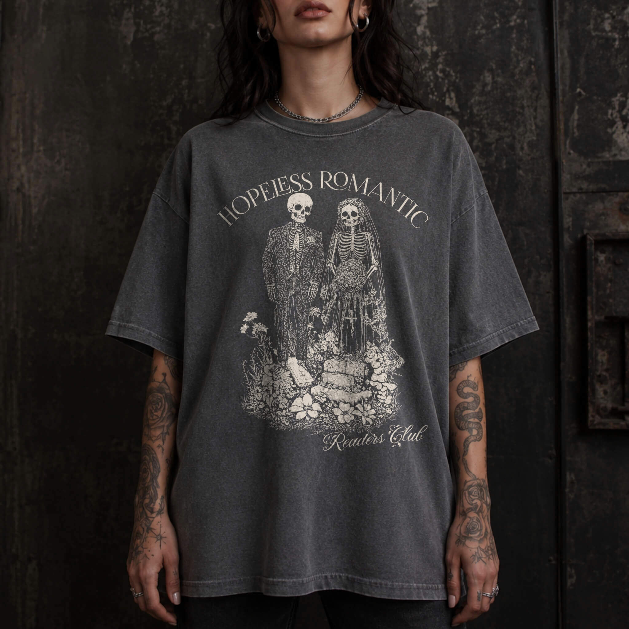 Hopeless Romantic Readers Club Tee in Pepper – vintage-style Comfort Colors graphic tee for dark romance readers. Graphic features a skeleton couple on their wedding day.