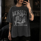 Morally Grey Is My Favorite Color dark academia design on a pepper color tee from Comfort Colors with vintage stacked books and quill graphic.