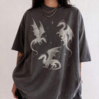 Pepper color Comfort Colors 1717 relaxed fit t-shirt with whimsigoth fantasy graphic — three detailed dragon illustrations surrounded by stars and celestial details in off-white line art